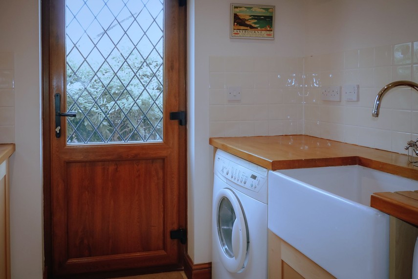 Utility room with washer and dryer