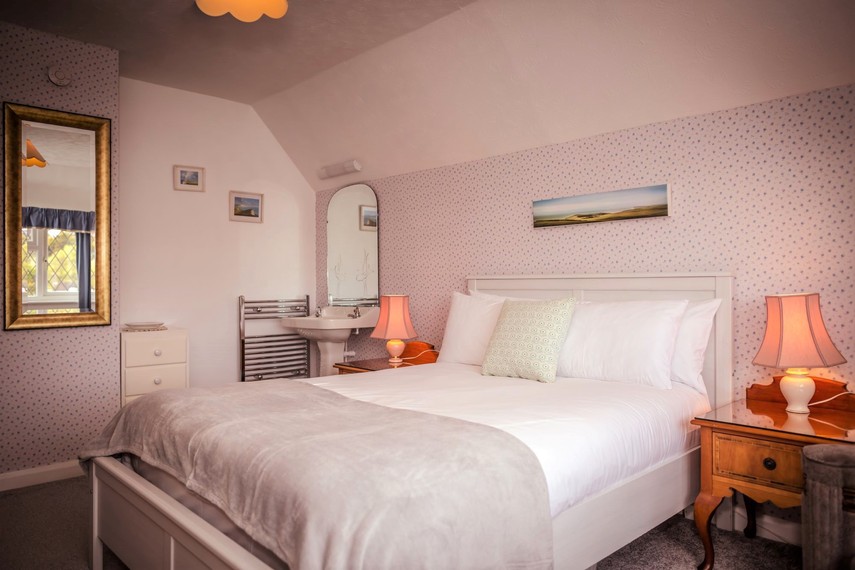 Master bedroom in South Downs cottage